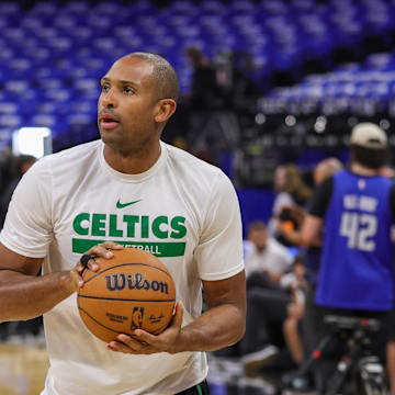 Apr 25, 2025; Orlando, Florida, USA; Boston Celtics center Al Horford (42) warms up before game three of first round for the 2024 NBA Playoffs against the Orlando Magic at Kia Center. Mandatory Credit: Mike Watters-Imagn Images