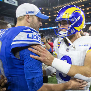 Jan 14, 2024; Detroit, Michigan, USA; Detroit Lions quarterback Jared Goff (16) and Los Angeles Rams quarterback Matthew Stafford (9) greet each other after a 2024 NFC wild card game at Ford Field. Mandatory Credit: David Reginek-Imagn Images