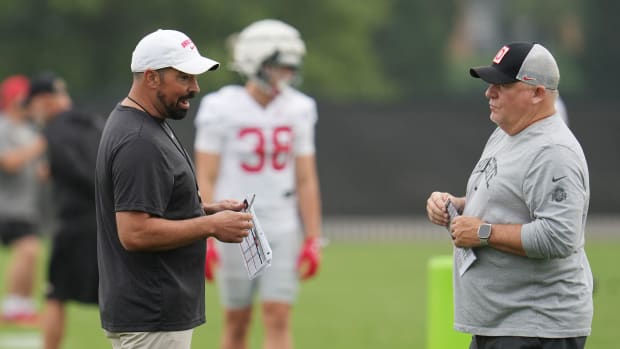 Aug 2, 2024; Columbus, Ohio, USA; Ohio State Buckeyes head coach Ryan Day talks with Offensive Coordinator Chip Kelly during 