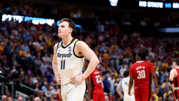 Mar 29, 2024; Dallas, TX, USA; Marquette Golden Eagles guard Tyler Kolek (11) reacts during the second half in the semifinals of the South Regional of the 2024 NCAA Tournament against the North Carolina State Wolfpack at American Airlines Center. Mandatory Credit: Kevin Jairaj-USA TODAY Sports 