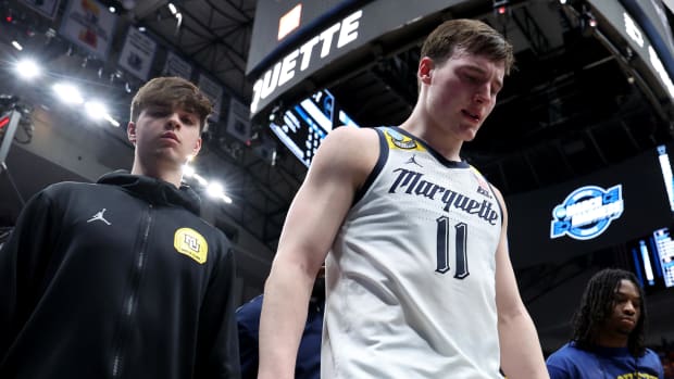 Mar 29, 2024; Dallas, TX, USA; Marquette Golden Eagles guard Tyler Kolek (11) leaves the court after losing to the North Carolina State Wolfpack in the semifinals of the South Regional of the 2024 NCAA Tournament at American Airlines Center. Mandatory Credit: Kevin Jairaj-USA TODAY Sports 