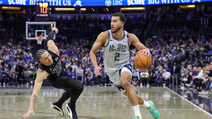 Atlanta Hawks guard Caleb Houstan drives past Brooklyn Nets forward Jalen Wilson