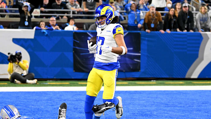 Jan 14, 2024; Detroit, Michigan, USA; Los Angeles Rams wide receiver Puka Nacua (17) scores a touchdown against Detroit Lions cornerback Cameron Sutton (1) during the first half of a 2024 NFC wild card game at Ford Field. Mandatory Credit: Lon Horwedel-Imagn Images