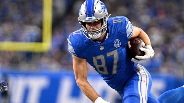 Jan 14, 2024; Detroit, Michigan, USA; Detroit Lions tight end Sam LaPorta (87) runs after a catch during the first half of a 2024 NFC wild card game against the Los Angeles Rams at Ford Field. Mandatory Credit: Lon Horwedel-Imagn Images