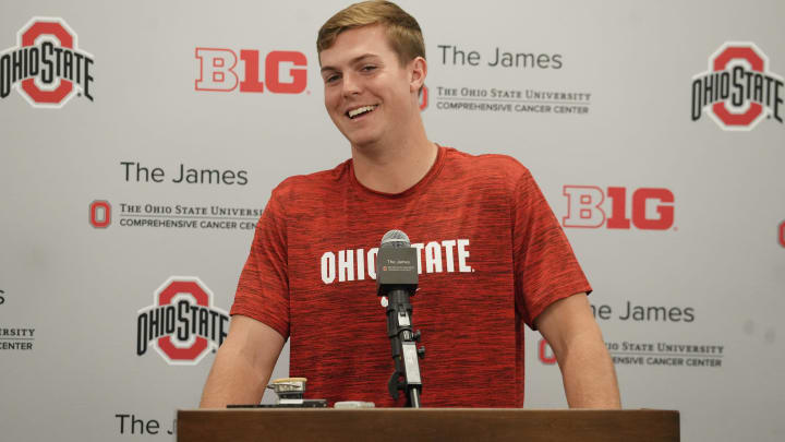 Aug 27, 2024; Columbus, OH, United States; Ohio State football quarterback Will Howard smiles as he speaks with the media August 27, 2024 in the team meeting room.