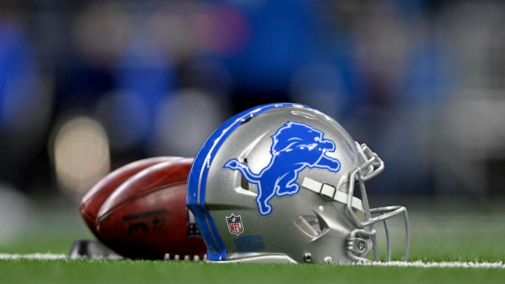 Jan 14, 2024; Detroit, Michigan, USA;  Footballs and a Detroit Lions helmet before a 2024 NFC wild card game between the Lions and Los Angeles Rams at Ford Field. Mandatory Credit: Lon Horwedel-Imagn Images