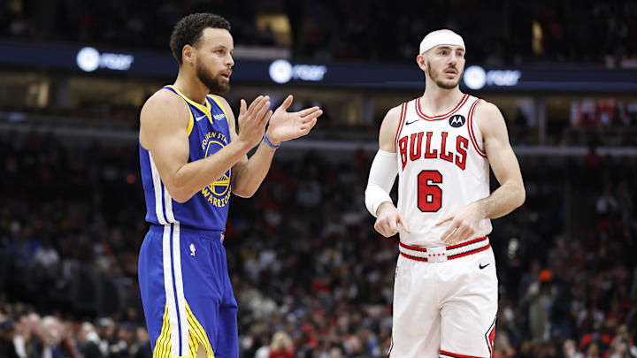 Jan 12, 2024; Chicago, Illinois, USA; Golden State Warriors guard Stephen Curry (30) reacts after a play against Chicago Bulls guard Alex Caruso (6) during the first half at United Center. Mandatory Credit: Kamil Krzaczynski-Imagn Images Jan 12, 2024; Chicago, Illinois, USA; Golden State Warriors guard Stephen Curry (30) reacts after a play against Chicago Bulls guard Alex Caruso (6) during the first half at United Center. Mandatory Credit: Kamil Krzaczynski-Imagn Images
