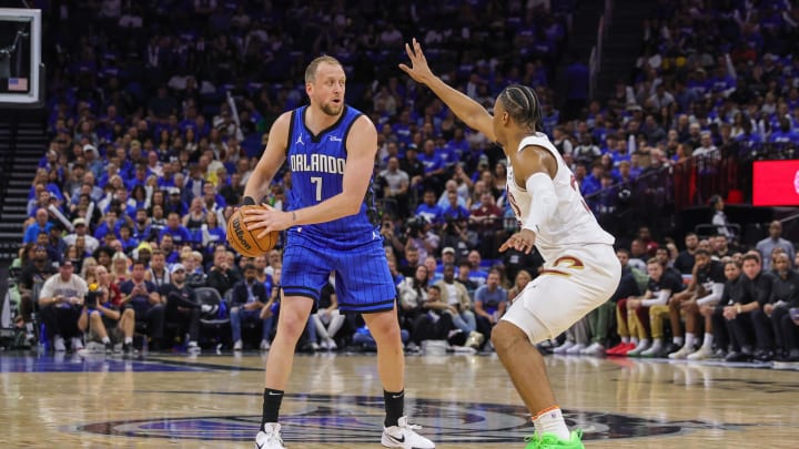 May 3, 2024; Orlando, Florida, USA; Cleveland Cavaliers forward Isaac Okoro (35) defends Orlando Magic guard Joe Ingles (7) during the second quarter of game six of the first round for the 2024 NBA playoffs at Kia Center. Mandatory Credit: Mike Watters-USA TODAY Sports