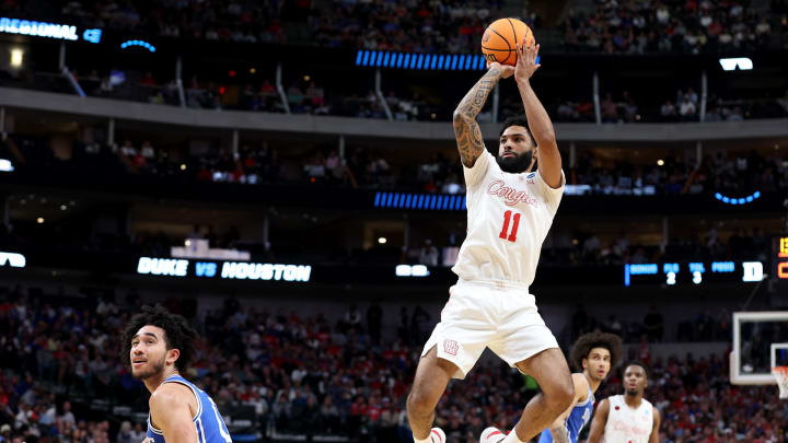 Mar 29, 2024; Dallas, TX, USA; Houston Cougars guard Damian Dunn (11) shoots against Duke Blue Devils guard Jared McCain (0) during the first half in the semifinals of the South Regional of the 2024 NCAA Tournament at American Airlines Center. Mandatory Credit: Tim Heitman-USA TODAY Sports 