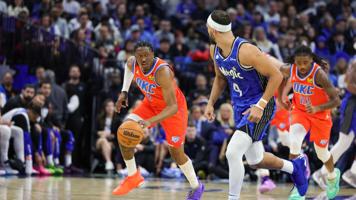 Feb 13, 2024; Orlando, Florida, USA; Oklahoma City Thunder forward Jalen Williams (8) brings the ball up court during the second half against the Orlando Magic at Amway Center. Mandatory Credit: Mike Watters-USA TODAY Sports