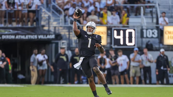 Sep 7, 2024; Orlando, Florida, USA; UCF Knights quarterback KJ Jefferson (1) throws a pass during the first quarter against the Sam Houston State Bearkats at FBC Mortgage Stadium. Mandatory Credit: Mike Watters-Imagn Images