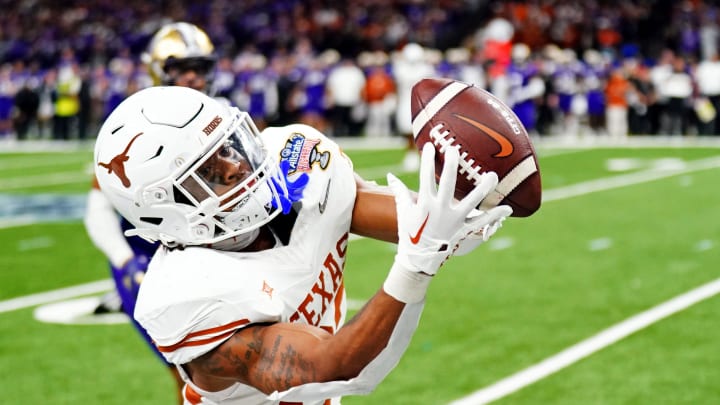 Jan 1, 2024; New Orleans, LA, USA; Texas Longhorns running back Jaydon Blue (23) makes a catch during the fourth quarter against the Washington Huskies in the 2024 Sugar Bowl college football playoff semifinal game at Caesars Superdome. Mandatory Credit: John David Mercer-USA TODAY Sports