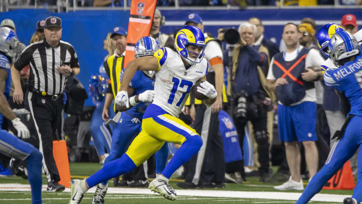 Jan 14, 2024; Detroit, Michigan, USA; Los Angeles Rams wide receiver Puka Nacua (17) runs after a catch during the second half of a 2024 NFC wild card game against the Detroit Lions at Ford Field. Mandatory Credit: David Reginek-USA TODAY Sports