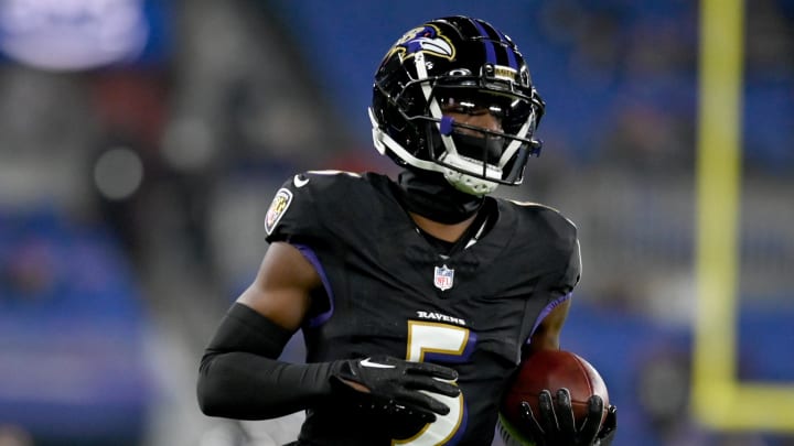 Nov 16, 2023; Baltimore, Maryland, USA; Baltimore Ravens cornerback Jalyn Armour-Davis (5) warms up before a game against the Cincinnati Bengals at M&T Bank Stadium. Mandatory Credit: Tommy Gilligan-USA TODAY Sports