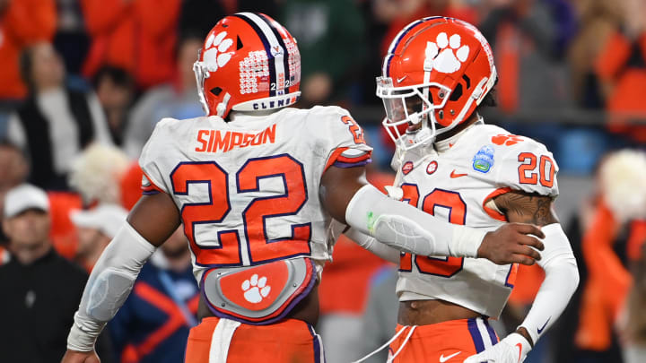 Dec 3, 2022; Charlotte, North Carolina, USA; Clemson Tigers cornerback Nate Wiggins (20) celebrates with linebacker Trenton Simpson (22) after breaking up a pass during the second quarter of the ACC Championship game against the North Carolina Tar Heels at Bank of America Stadium. Mandatory Credit: Bob Donnan-USA TODAY Sports