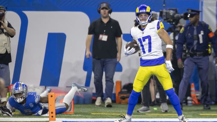 Jan 14, 2024; Detroit, Michigan, USA; Los Angeles Rams wide receiver Puka Nacua (17) scores a touchdown against Detroit Lions safety C.J. Gardner-Johnson (2) during the first half of a 2024 NFC wild card game at Ford Field. Mandatory Credit: David Reginek-USA TODAY Sports