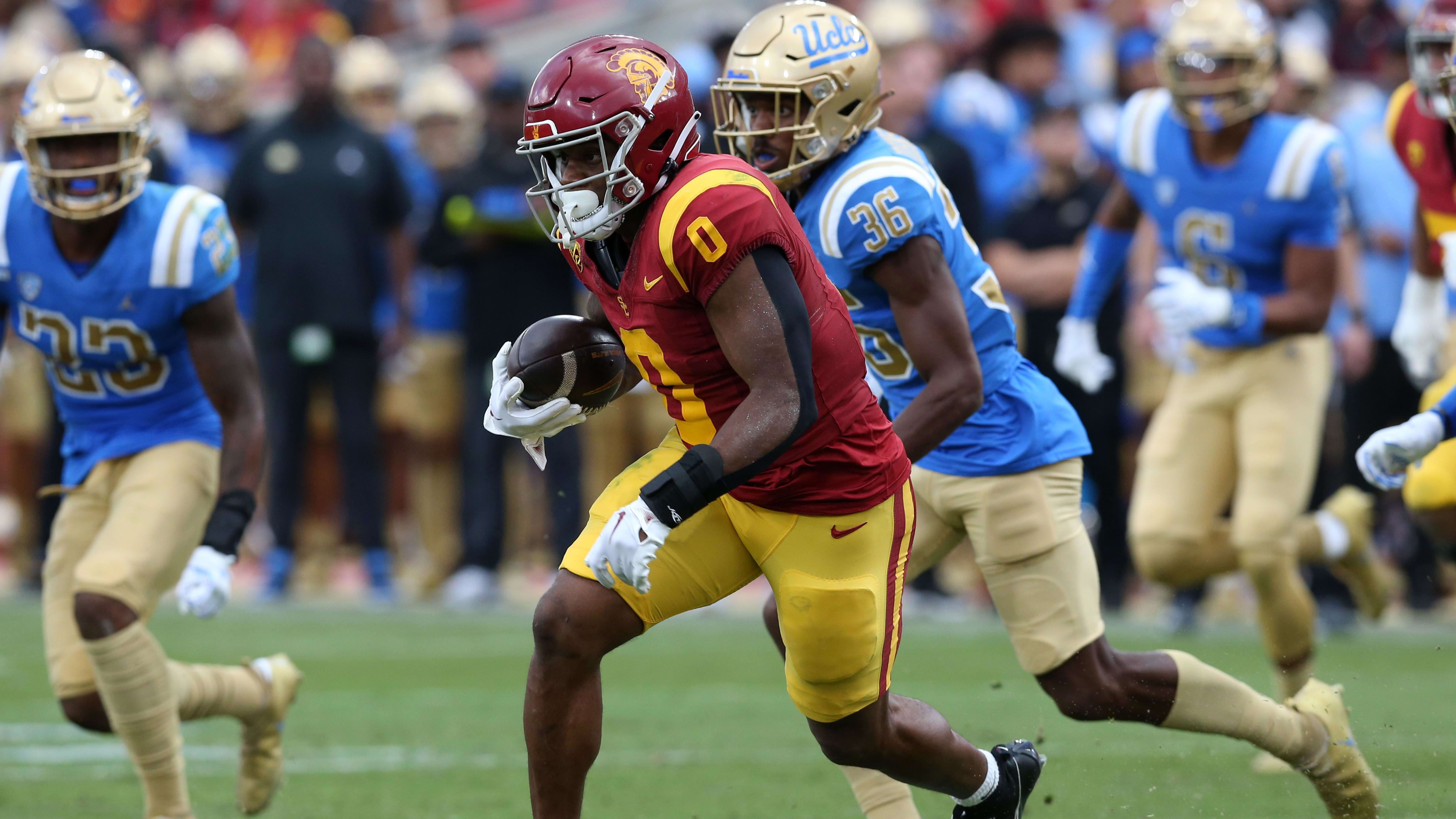 USC Trojans running back MarShawn Lloyd (0) runs against UCLA.