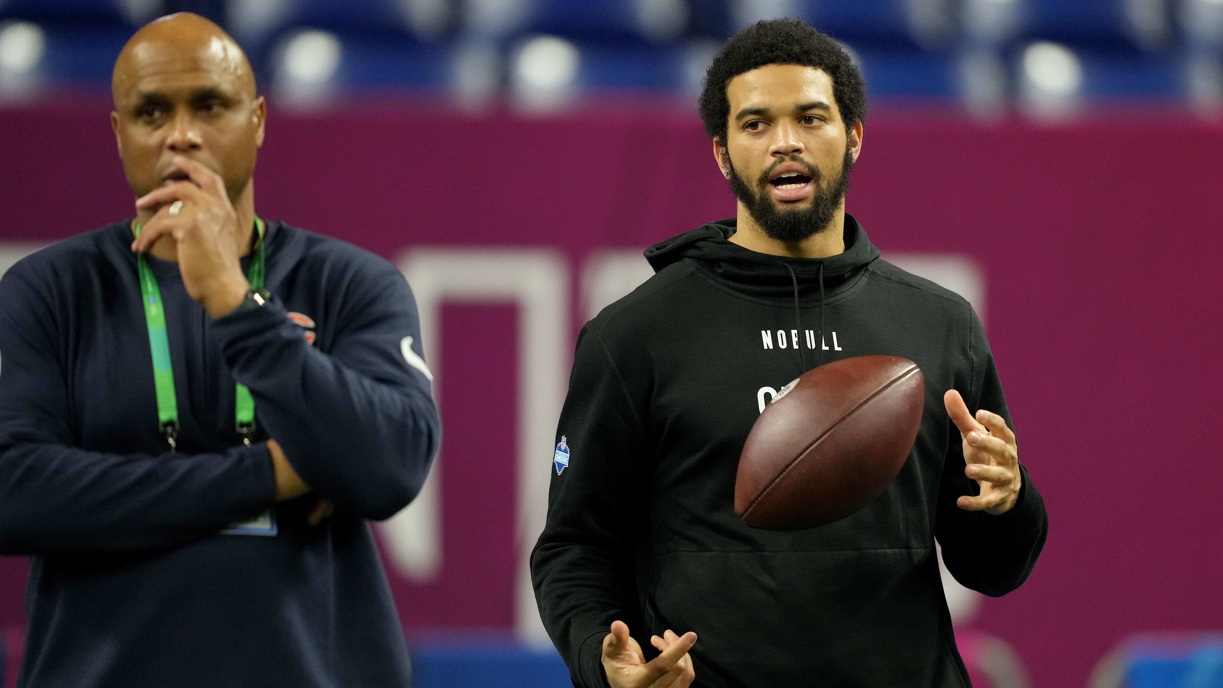 Caleb Williams talks with Bears QB coach Kerry Joseph at the combine. Williams was at Halas Hall Wednesday.