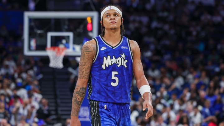 Apr 14, 2024; Orlando Magic forward Paolo Banchero (5) walks up court after a play during the second half against the Milwaukee Bucks at KIA Center. 