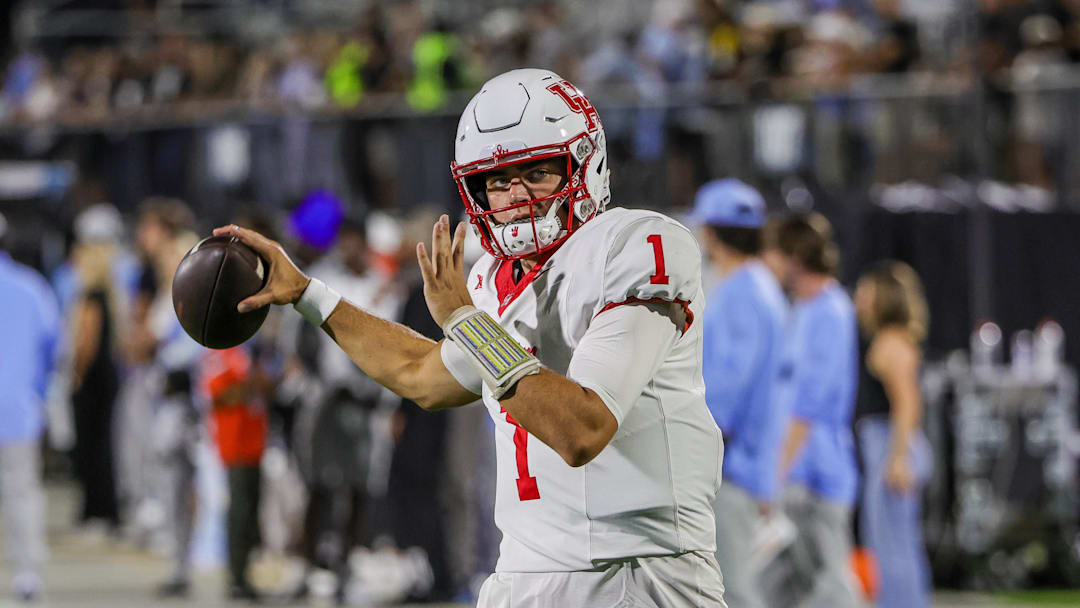 Houston Cougars quarterback Conner Weigman warms up before the game against the UCF Knights at Acrisure Bounce House.