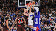 Dec 1, 2025; Orlando, Florida, USA; Orlando Magic forward Noah Penda (93) goes to the basket against Chicago Bulls forward Matas Buzelis (14) during the second half at Kia Center. Mandatory Credit: Mike Watters-Imagn Images