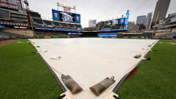 May 13, 2023; Minneapolis, Minnesota, USA;  A tarp covers the infield during a rain delay before a game between the Chicago Cubs vs Minnesota Twins at Target Field. Mandatory Credit: Jordan Johnson-USA TODAY Sports