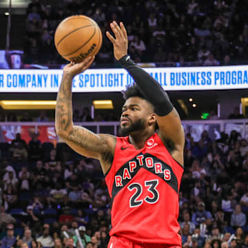 Mar 2, 2025; Orlando, Florida, USA; Toronto Raptors guard Jamal Shead (23) shoots during the second half against the Orlando Magic at Kia Center. Mandatory Credit: Mike Watters-Imagn Images