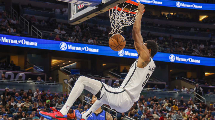 Feb 27, 2024; Orlando, Florida, USA; Brooklyn Nets center Nic Claxton (33) dunks during the second half against the Orlando Magic at Amway Center. 