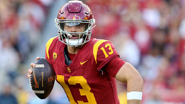  USC Trojans quarterback Caleb Williams (13) scrambles during the second quarter against the UCLA Bruins 