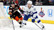 Mar 24, 2024; Anaheim, California, USA; Tampa Bay Lightning left wing Conor Sheary (73) passes from Anaheim Ducks center Ben Meyers (39) during the first period at Honda Center. Mandatory Credit: Jason Parkhurst-Imagn Images