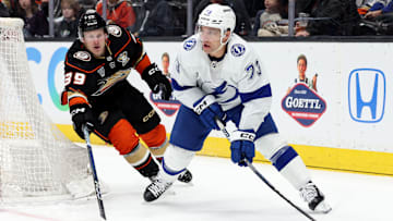 Mar 24, 2024; Anaheim, California, USA; Tampa Bay Lightning left wing Conor Sheary (73) passes from Anaheim Ducks center Ben Meyers (39) during the first period at Honda Center. Mandatory Credit: Jason Parkhurst-Imagn Images