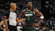 NBA referee Marc Davis talks to Minnesota Timberwolves guard Anthony Edwards during the second quarter in Game 5 of the Western Conference finals against the Dallas Mavericks at Target Center in Minneapolis on May 30, 2024.