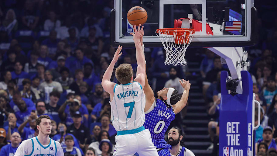 Hornets guard Kon Knueppel shoots against Magic guard Anthony Black.