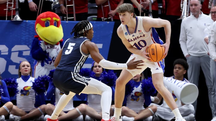Kansas Jayhawks guard Johnny Furphy (10) looks to pass against Samford Bulldogs guard A.J. Staton-McCray (5) during the second half in the first round of the 2024 NCAA Tournament. Mandatory Credit: Rob Gray-USA TODAY Sports