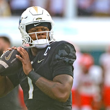 Sep 7, 2024; Orlando, Florida, USA; UCF Knights quarterback KJ Jefferson (1) warms up before the game against the Sam Houston State Bearkats at FBC Mortgage Stadium. Mandatory Credit: Mike Watters-Imagn Images