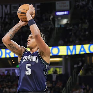 Orlando Magic forward Paolo Banchero (5) shoots a three point basket during the second quarter against the Chicago Bulls at KIA Center. 