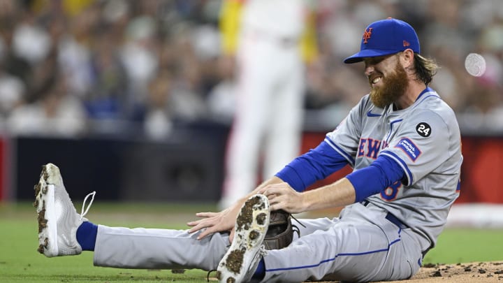 Aug 23, 2024; San Diego, California, USA; New York Mets starting pitcher Paul Blackburn (58) reacts after being hit during the third inning against the San Diego Padres at Petco Park. Mandatory Credit: Denis Poroy-USA TODAY Sports