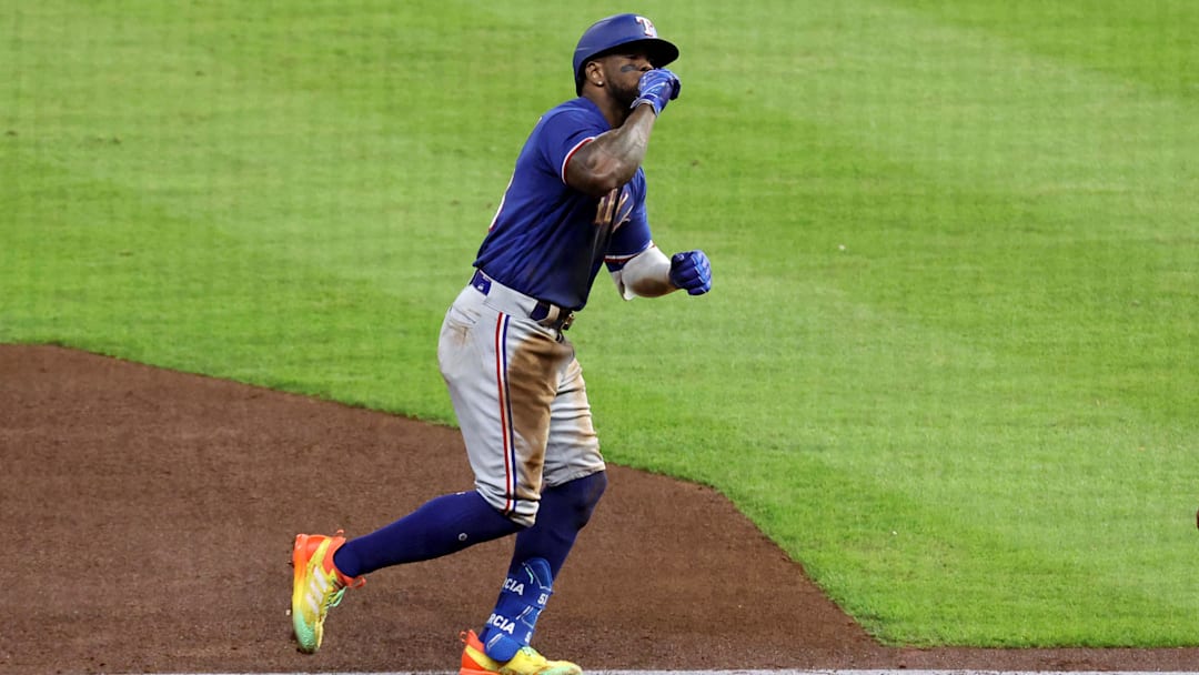 Oct 23, 2023; Houston, Texas, USA; Texas Rangers right fielder Adolis Garcia (53) reacts after hitting a home run during the third inning of game seven in the ALCS against the Houston Astros for the 2023 MLB playoffs at Minute Maid Park.  Mandatory Credit: Troy Taormina-Imagn Images