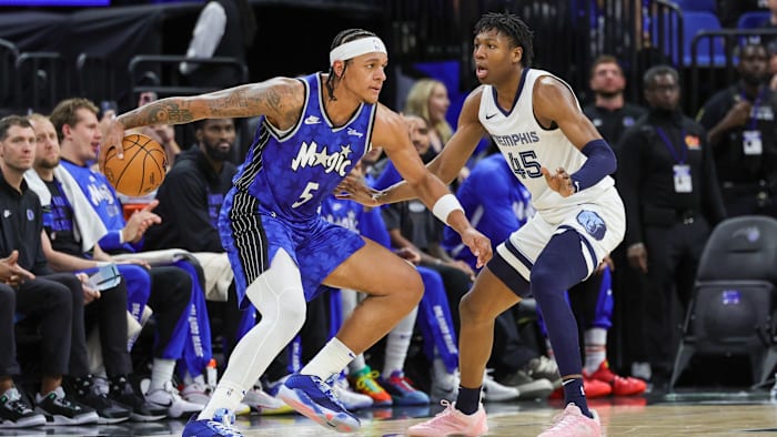 Mar 30, 2024; Orlando, Florida, USA; Orlando Magic forward Paolo Banchero (5) controls the ball in