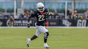 Oct 12, 2024; Orlando, Florida, USA; UCF Knights running back Myles Montgomery (22) runs the ball during the first quarter against the Cincinnati Bearcats at FBC Mortgage Stadium. Mandatory Credit: Mike Watters-Imagn Images