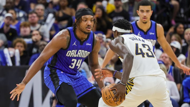 Mar 10, 2024; Orlando, Florida, USA; Orlando Magic center Wendell Carter Jr. (34) defends Indiana Pacers forward Pascal Siakam (43) during the second quarter at KIA Center. Mandatory Credit: Mike Watters-USA TODAY Sports