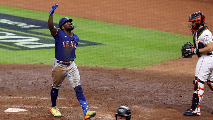 Oct 23, 2023; Houston, Texas, USA; Texas Rangers right fielder Adolis Garcia (53) celebrates after hitting a home run during the eighth inning of game seven in the ALCS against the Houston Astros for the 2023 MLB playoffs at Minute Maid Park.  Mandatory Credit: Troy Taormina-USA TODAY Sports