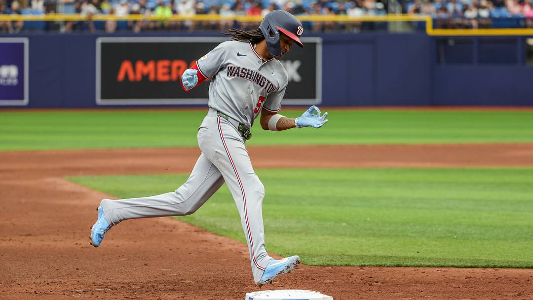 Jun 21, 2026; St. Petersburg, Florida, USA; Washington Nationals shortstop CJ Abrams (5) hits a home run during the sixth inning against the Tampa Bay Rays at Tropicana Field. Mandatory Credit: Mike Watters-Imagn Images