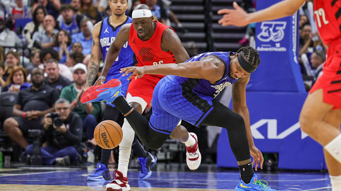 Apr 1, 2024; Orlando, Florida, USA; Orlando Magic center Wendell Carter Jr. (34) and Portland Trail