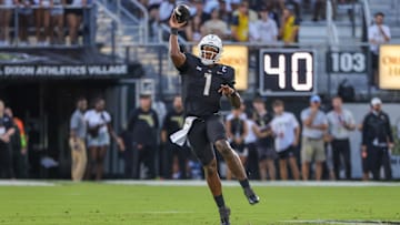 Sep 7, 2024; Orlando, Florida, USA; UCF Knights quarterback KJ Jefferson (1) throws a pass during the first quarter against the Sam Houston State Bearkats at FBC Mortgage Stadium. Mandatory Credit: Mike Watters-Imagn Images