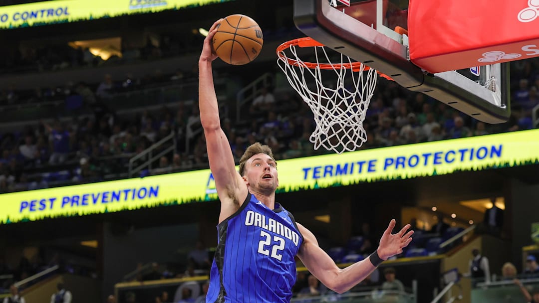 Apr 25, 2025; Orlando, Florida, USA; Orlando Magic forward Franz Wagner (22) dunks against the Boston Celtics during the second quarter of game three of first round for the 2024 NBA Playoffs at Kia Center. Mandatory Credit: Mike Watters-Imagn Images