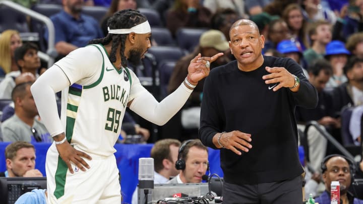 Milwaukee Bucks head coach Doc Rivers talks with Milwaukee Bucks forward Jae Crowder (99) during the second quarter against the Orlando Magic at KIA Center. 