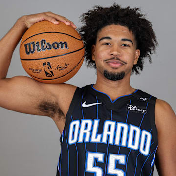 Sep 30, 2024; Orlando, FL, USA; Orlando Magic guard Ethan Thompson (55) poses for a photo during Media Day at AdventHealth Training Center. Mandatory Credit: Mike Watters-Imagn Images