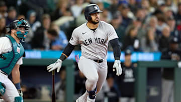 May 14, 2025; Seattle, Washington, USA; New York Yankees left fielder Jasson Dominguez (24) hits an RBI doube against the Seattle Mariners during the sixth inning at T-Mobile Park. Mandatory Credit: John Froschauer-Imagn Images