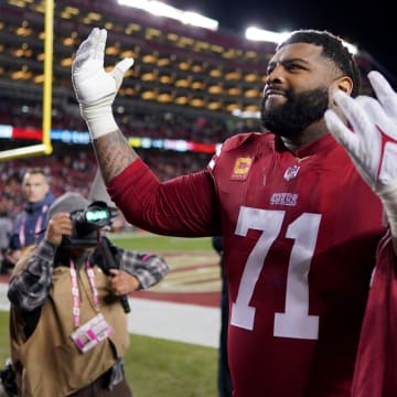 Jan 22, 2023; Santa Clara, California, USA; San Francisco 49ers offensive tackle Trent Williams (71) celebrates after defeating the Dallas Cowboys 19-12 in a NFC divisional round game at Levi's Stadium. Mandatory Credit: Kyle Terada-USA TODAY Sports